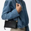 Bolsa Joya en piel de becerro napa negra Bolsa Joya en piel de becerro napa negra