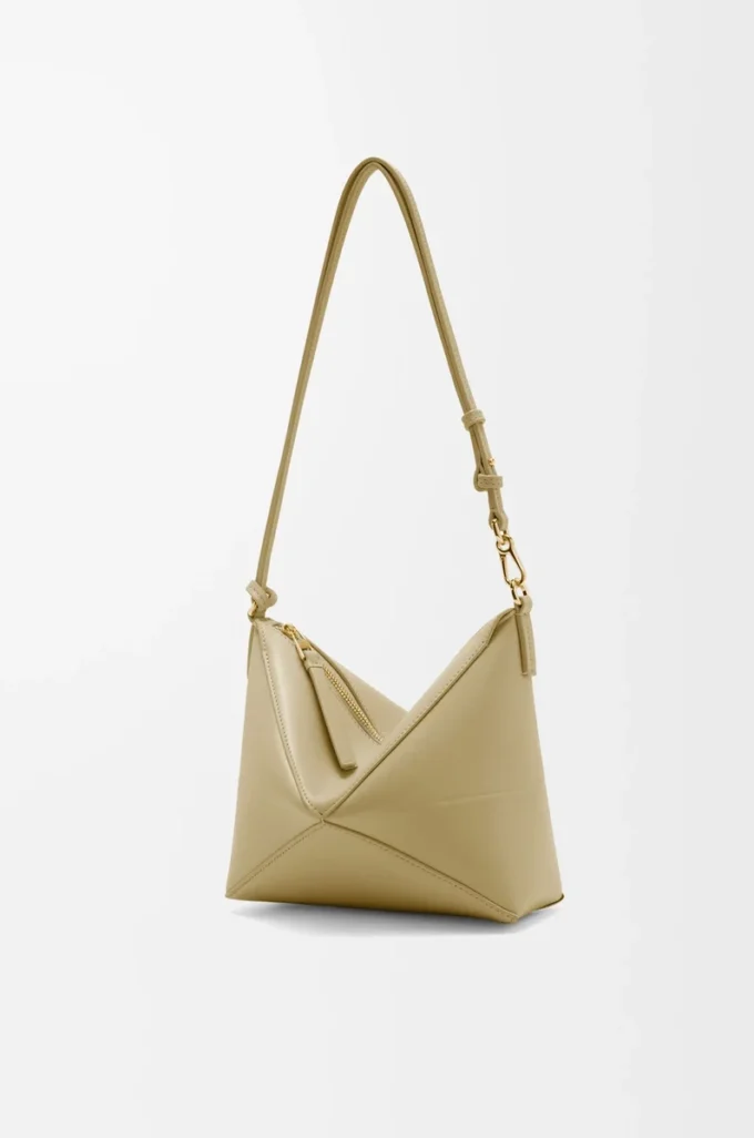 Bolsa Puzzle Fold en piel de becerro napa brillante verde arcilla Bolsa Puzzle Fold en piel de becerro napa brillante verde arcilla