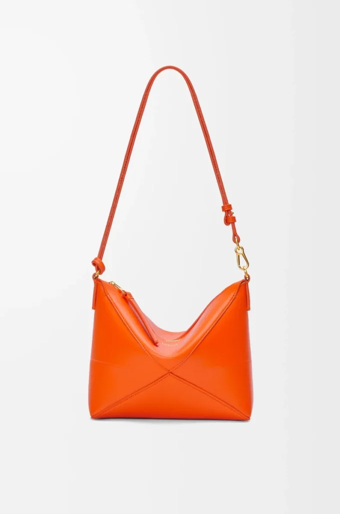Bolsa Puzzle Fold en piel de becerro napa brillante Vivid Orange Bolsa Puzzle Fold en piel de becerro napa brillante Vivid Orange