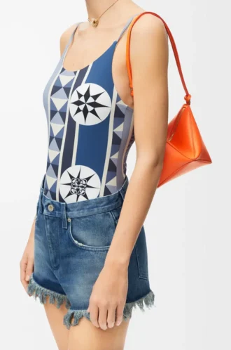 Bolsa Puzzle Fold en piel de becerro napa brillante Vivid Orange