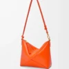 Bolsa Puzzle Fold en piel de becerro napa brillante Vivid Orange Bolsa Puzzle Fold en piel de becerro napa brillante Vivid Orange