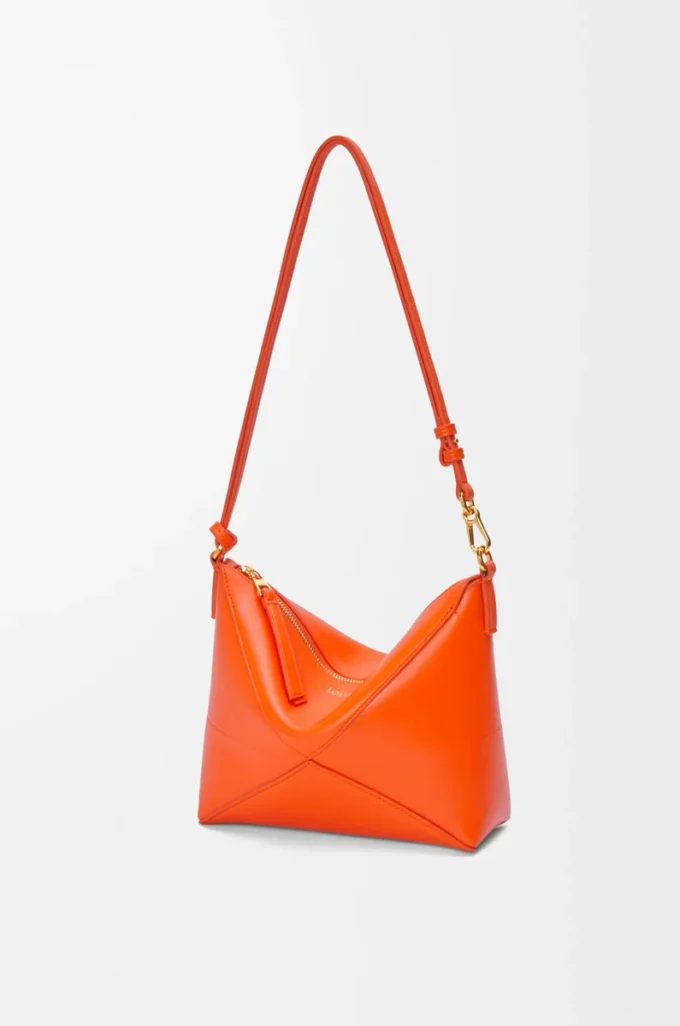 Bolsa Puzzle Fold en piel de becerro napa brillante Vivid Orange Bolsa Puzzle Fold en piel de becerro napa brillante Vivid Orange