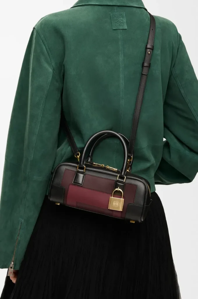 Bolso Amazona 23 recortado en piel de becerro napa negro/burdeos Bolso Amazona 23 recortado en piel de becerro napa negro/burdeos