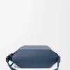 Bolso bandolera convertible en piel de becerro clásica teñida en índigo