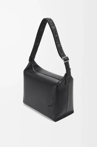 Bolso bandolera Cubi en piel de becerro suave y flexible y jacquard negro