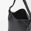 Bolso bandolera Cubi en piel de becerro suave y flexible y jacquard negro