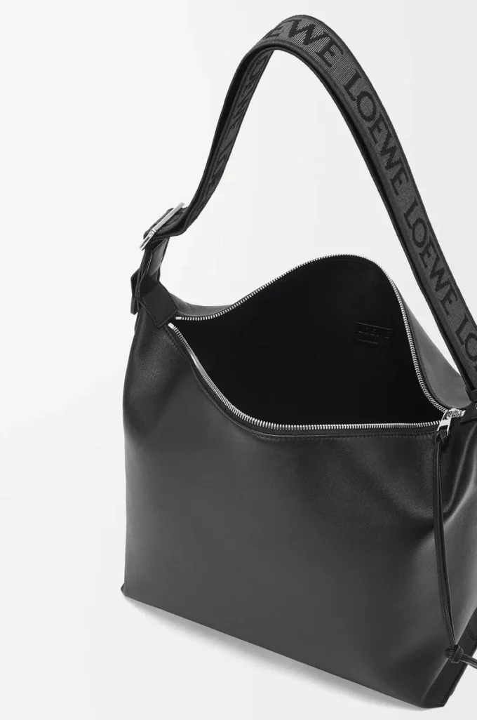 Bolso bandolera Cubi en piel de becerro suave y flexible y jacquard negro