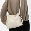 Bolso de mano Flamenco mediano en piel de becerro napa Sea Salt