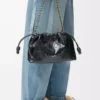 Bolso Flamenco mediano en piel de anguila, color negro Bolso Flamenco mediano en piel de anguila, color negro