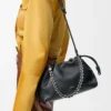 Bolso Flamenco mediano en piel de becerro de grano fino Negro Bolso Flamenco mediano en piel de becerro de grano fino Negro