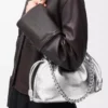 Bolso Flamenco mediano en piel de cordero laminada Plata Bolso Flamenco mediano en piel de cordero laminada Plata
