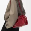 Bolso Flamenco mediano en piel de cordero napa suave Burnt Red