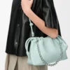 Bolso Flamenco mediano en piel de cordero napa suave color azul hielo Bolso Flamenco mediano en piel de cordero napa suave color azul hielo