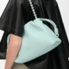 Bolso Flamenco mediano en piel de cordero napa suave color azul hielo Bolso Flamenco mediano en piel de cordero napa suave color azul hielo