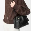 Bolso Flamenco mediano en suave piel de cordero napa. Negro