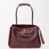 Bolso Madrid grande en piel de becerro flexible Burdeos oscuro Bolso Madrid grande en piel de becerro flexible Burdeos oscuro