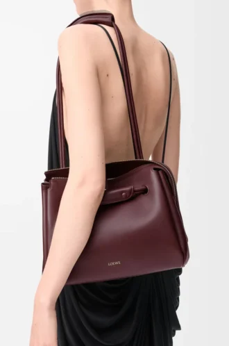 Bolso Madrid mediano en piel de becerro flexible color burdeos oscuro