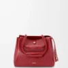 Bolso Madrid mediano en piel de becerro flexible color rojo quemado Bolso Madrid mediano en piel de becerro flexible color rojo quemado