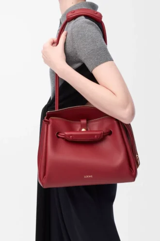 Bolso Madrid mediano en piel de becerro flexible color rojo quemado