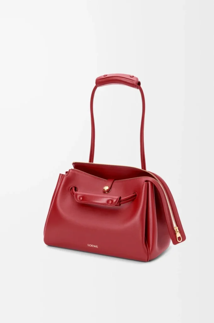 Bolso Madrid mediano en piel de becerro flexible color rojo quemado Bolso Madrid mediano en piel de becerro flexible color rojo quemado