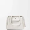 Bolso Madrid mediano en piel de becerro granulada flexible, color blanco suave Bolso Madrid mediano en piel de becerro granulada flexible, color blanco suave