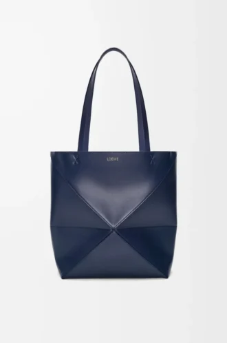Bolso mediano Puzzle Fold en piel de becerro brillante azul abismo