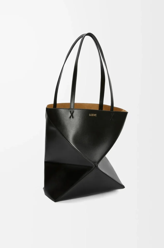 Bolso mediano Puzzle Fold en piel de becerro brillante negro Bolso mediano Puzzle Fold en piel de becerro brillante negro