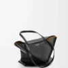 Bolso mediano Puzzle Fold en piel de becerro brillante negro Bolso mediano Puzzle Fold en piel de becerro brillante negro
