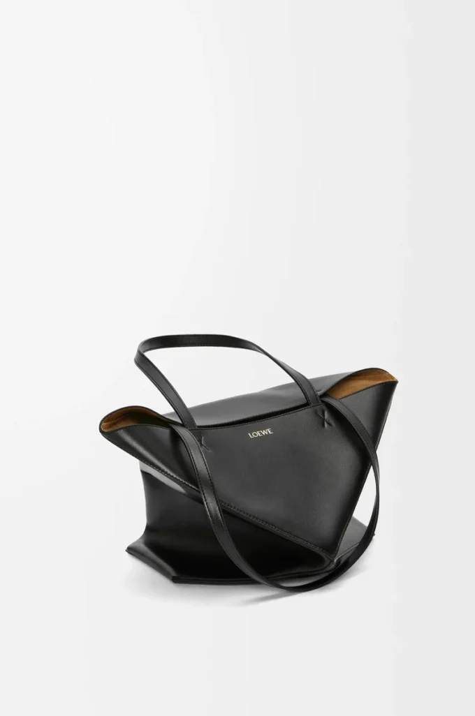 Bolso mediano Puzzle Fold en piel de becerro brillante negro Bolso mediano Puzzle Fold en piel de becerro brillante negro
