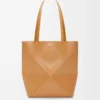 Bolso mediano Puzzle Fold en piel de becerro brillante Warm Desert Bolso mediano Puzzle Fold en piel de becerro brillante Warm Desert