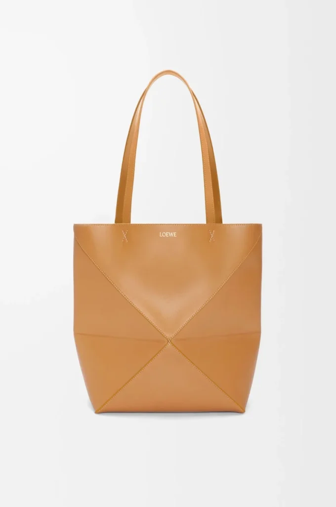 Bolso mediano Puzzle Fold en piel de becerro brillante Warm Desert Bolso mediano Puzzle Fold en piel de becerro brillante Warm Desert