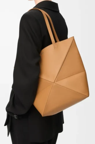 Bolso mediano Puzzle Fold en piel de becerro brillante Warm Desert