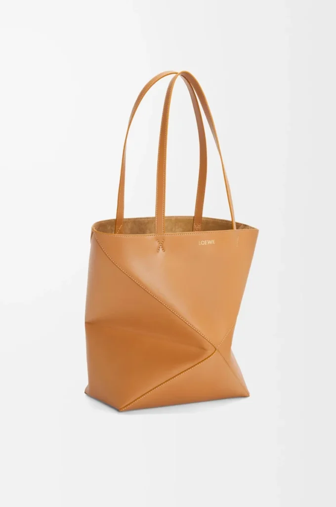 Bolso mediano Puzzle Fold en piel de becerro brillante Warm Desert Bolso mediano Puzzle Fold en piel de becerro brillante Warm Desert