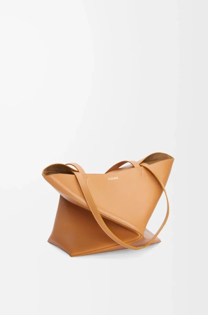 Bolso mediano Puzzle Fold en piel de becerro brillante Warm Desert Bolso mediano Puzzle Fold en piel de becerro brillante Warm Desert