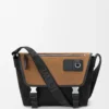 Bolso mensajero Flex mediano en lona y ante Negro/Oro oscuro Bolso mensajero Flex mediano en lona y ante Negro/Oro oscuro
