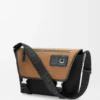 Bolso mensajero Flex mediano en lona y ante Negro/Oro oscuro Bolso mensajero Flex mediano en lona y ante Negro/Oro oscuro