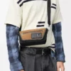 Bolso mensajero Mini Flex en lona y ante Negro/Oro oscuro