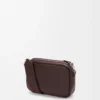 Bolso mensajero Pebble pequeño en piel de becerro granulada flexible Oxblood Bolso mensajero Pebble pequeño en piel de becerro granulada flexible Oxblood