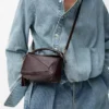 Bolso Mini Featherlight Puzzle en piel de cordero napa marrón oscuro Bolso Mini Featherlight Puzzle en piel de cordero napa marrón oscuro