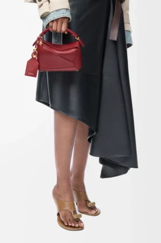 Bolso Mini Featherlight Puzzle en piel de cordero napa rojo quemado