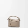 Bolso Mini Puzzle Edge en piel de becerro granulada suave Color arcilla Bolso Mini Puzzle Edge en piel de becerro granulada suave Color arcilla