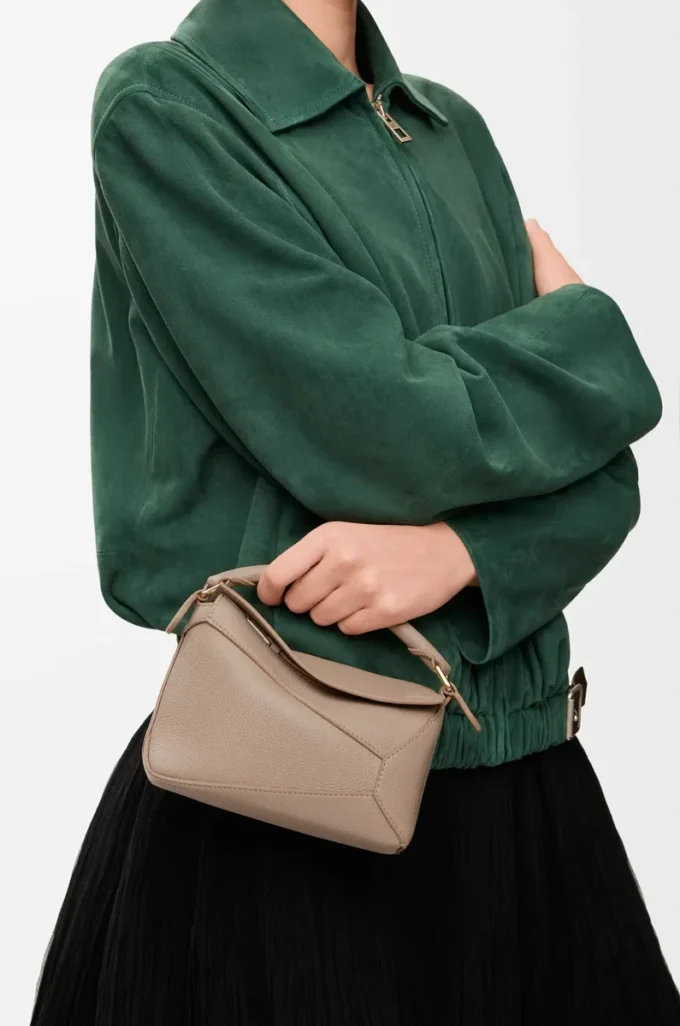 Bolso Mini Puzzle Edge en piel de becerro granulada suave color arena Bolso Mini Puzzle Edge en piel de becerro granulada suave color arena
