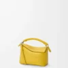 Bolso Mini Puzzle Edge en piel de becerro granulada suave color Dandelion Bolso Mini Puzzle Edge en piel de becerro granulada suave color Dandelion