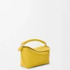 Bolso Mini Puzzle Edge en piel de becerro granulada suave color Dandelion Bolso Mini Puzzle Edge en piel de becerro granulada suave color Dandelion