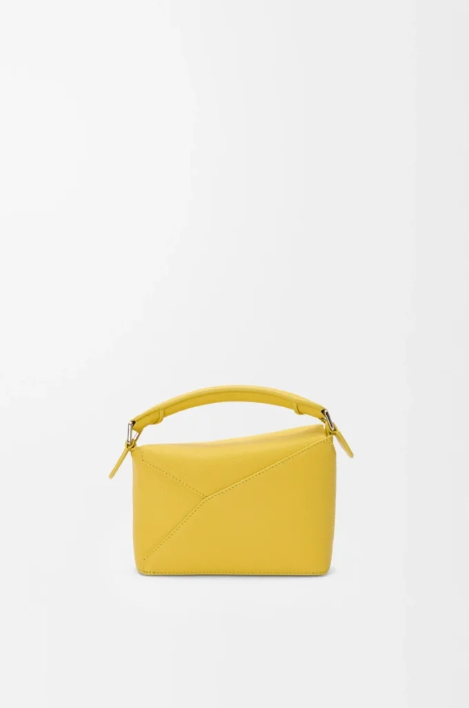 Bolso Mini Puzzle Edge en piel de becerro granulada suave color Dandelion Bolso Mini Puzzle Edge en piel de becerro granulada suave color Dandelion