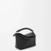 Bolso Mini Puzzle Edge en piel de becerro granulada suave, color negro