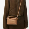 Bolso Mini Puzzle Edge en piel de becerro granulada suave color toffee