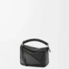 Bolso Mini Puzzle en piel de becerro lisa, color negro