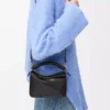 Bolso Mini Puzzle en piel de becerro lisa, color negro