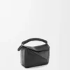 Bolso Mini Puzzle en piel de becerro lisa, color negro